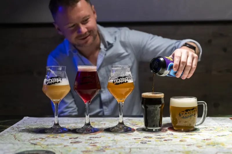 Beer tasting flight on a wooden table